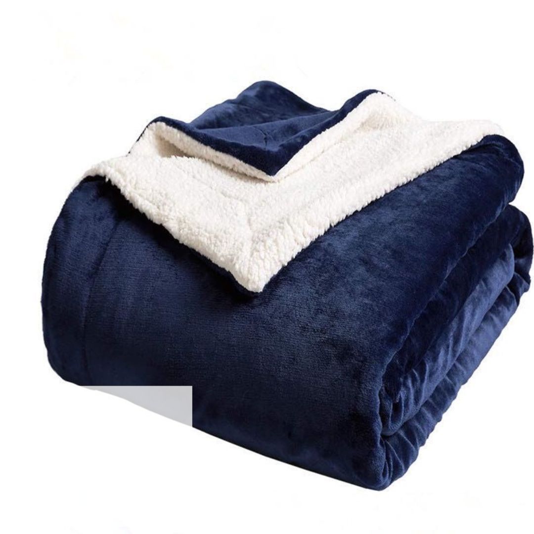 MANTA DE FELPA CON PIEL DE CARNERO AZUL ACERO